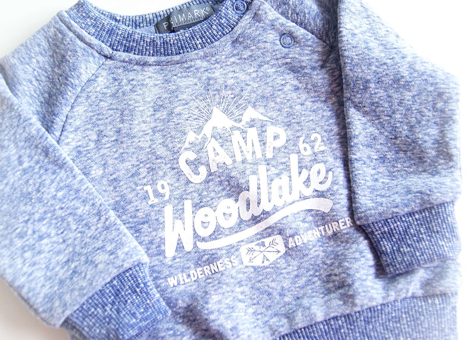 Primark babykleding blauwe trui Camp Woodlake